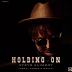 Holding On (feat. Annie O'Neill) rated a 5