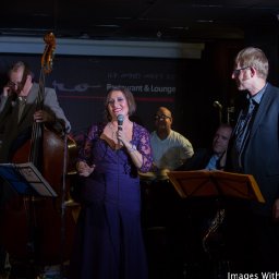 Monica with musicians,CD RELEASE.jpg