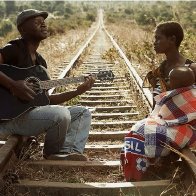 Man singing to woman in Africa from Sandra Luccio