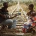 Man singing to woman in Africa from Sandra Luccio