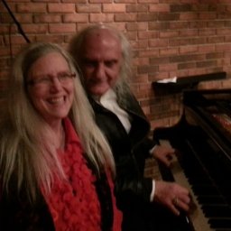 joe kidd & sheila burke at piano unity christmas 2014.jpg